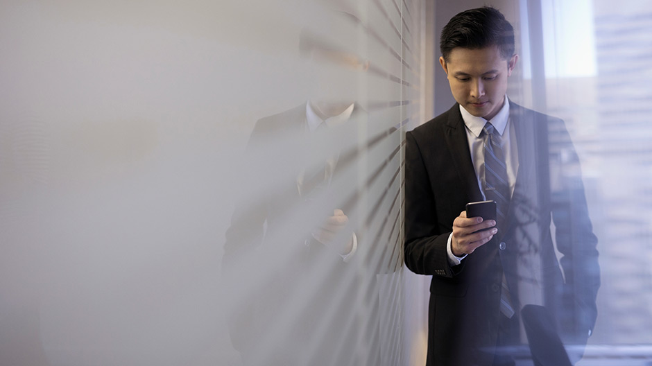 Man looking at his cellphone