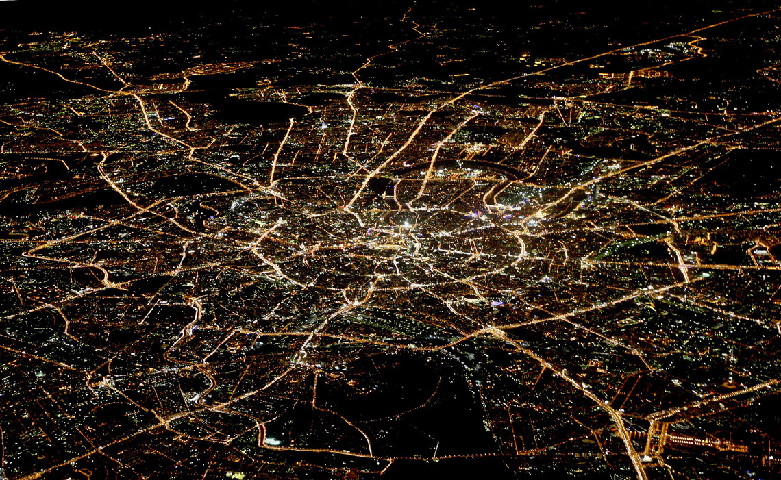 A general view of night Moscow is seen from the window of a passenger jet, October 8, 2010.